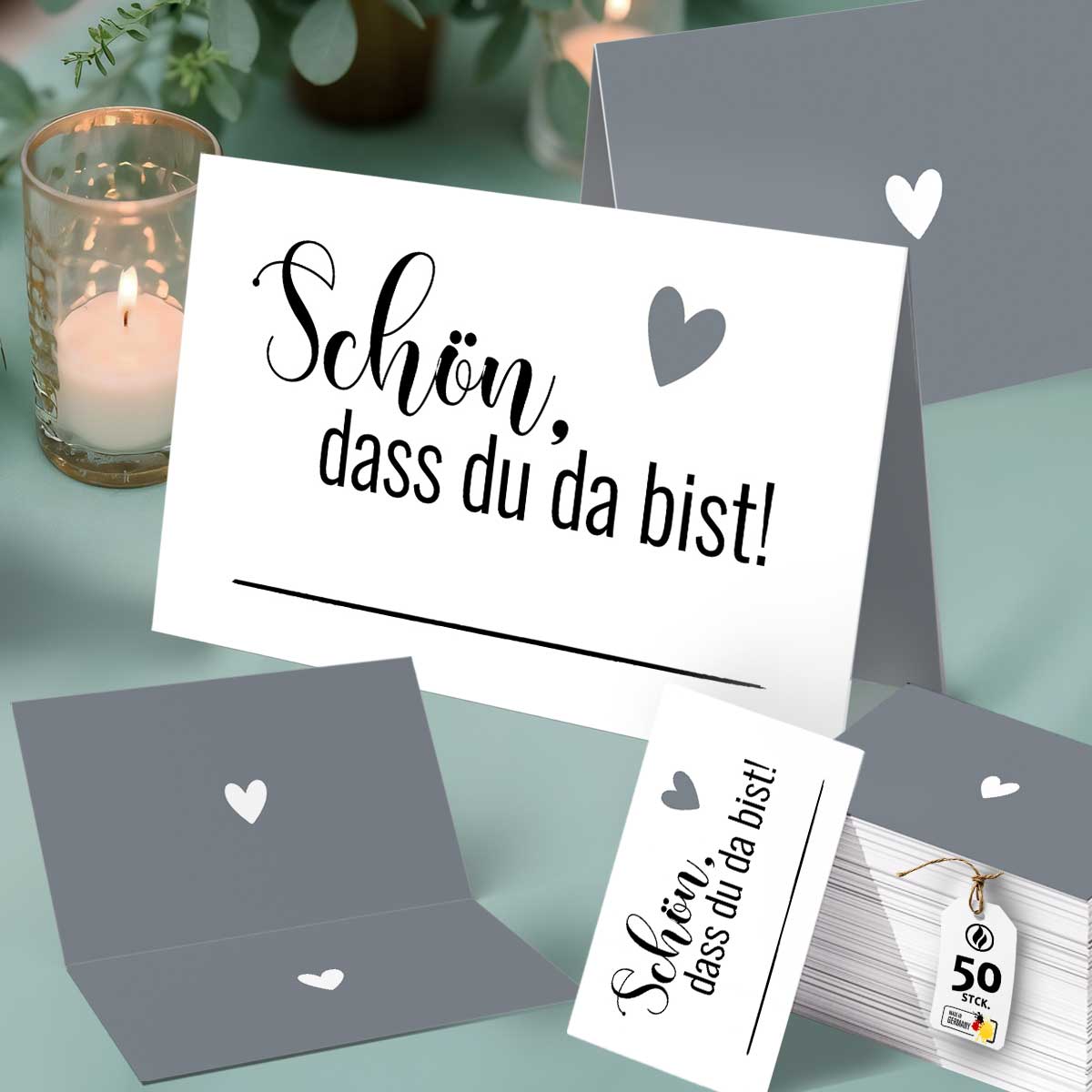 50 Tischkarten „Schön, dass du da bist“ – Platzkarten mit grauem Herzmotiv